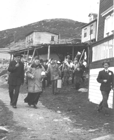 257: Fr. Fyme and a group of people, at Red Island.